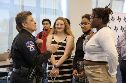 Women of Law Enforcement Speakers and Students conversing